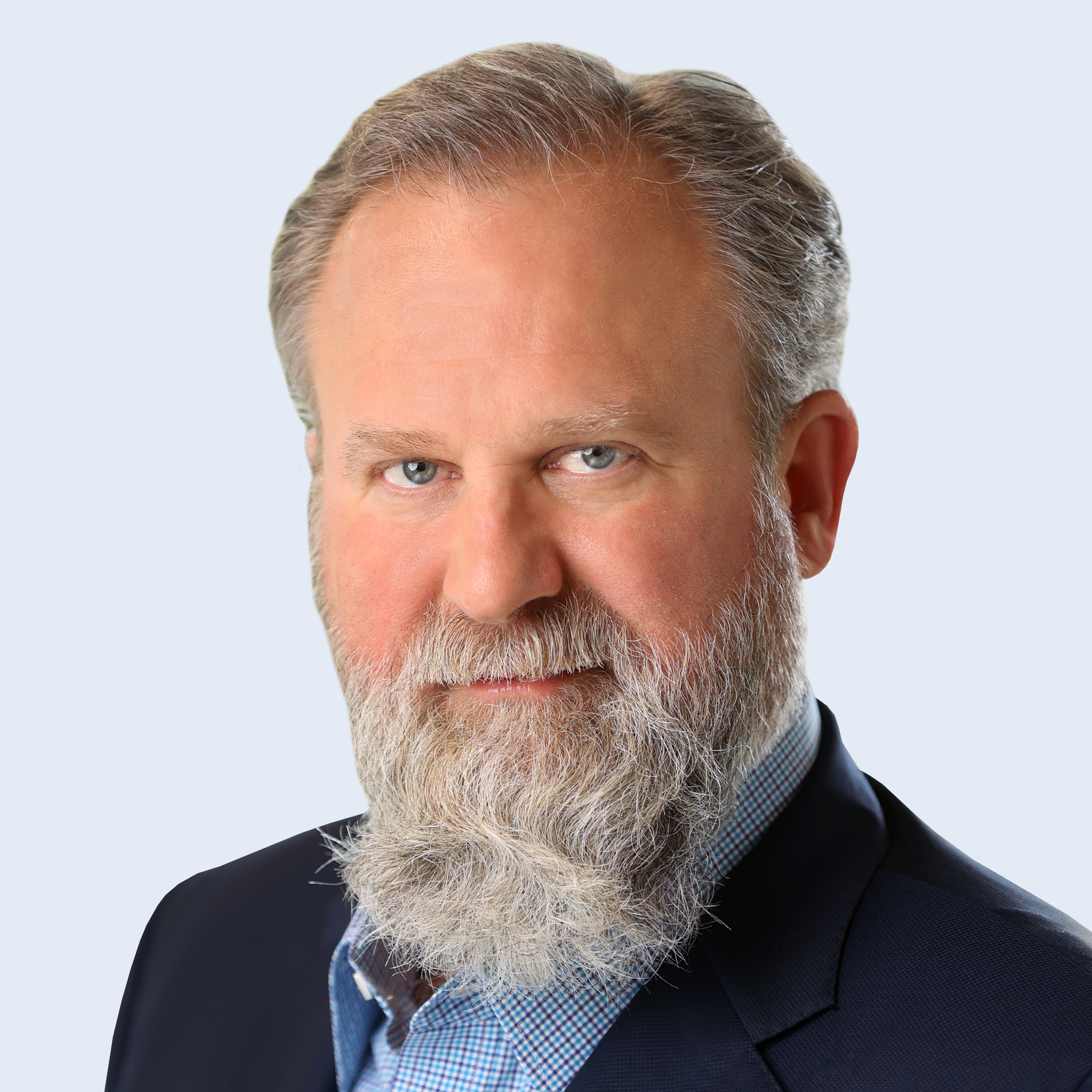 A headshot of Barry Fortner in suit