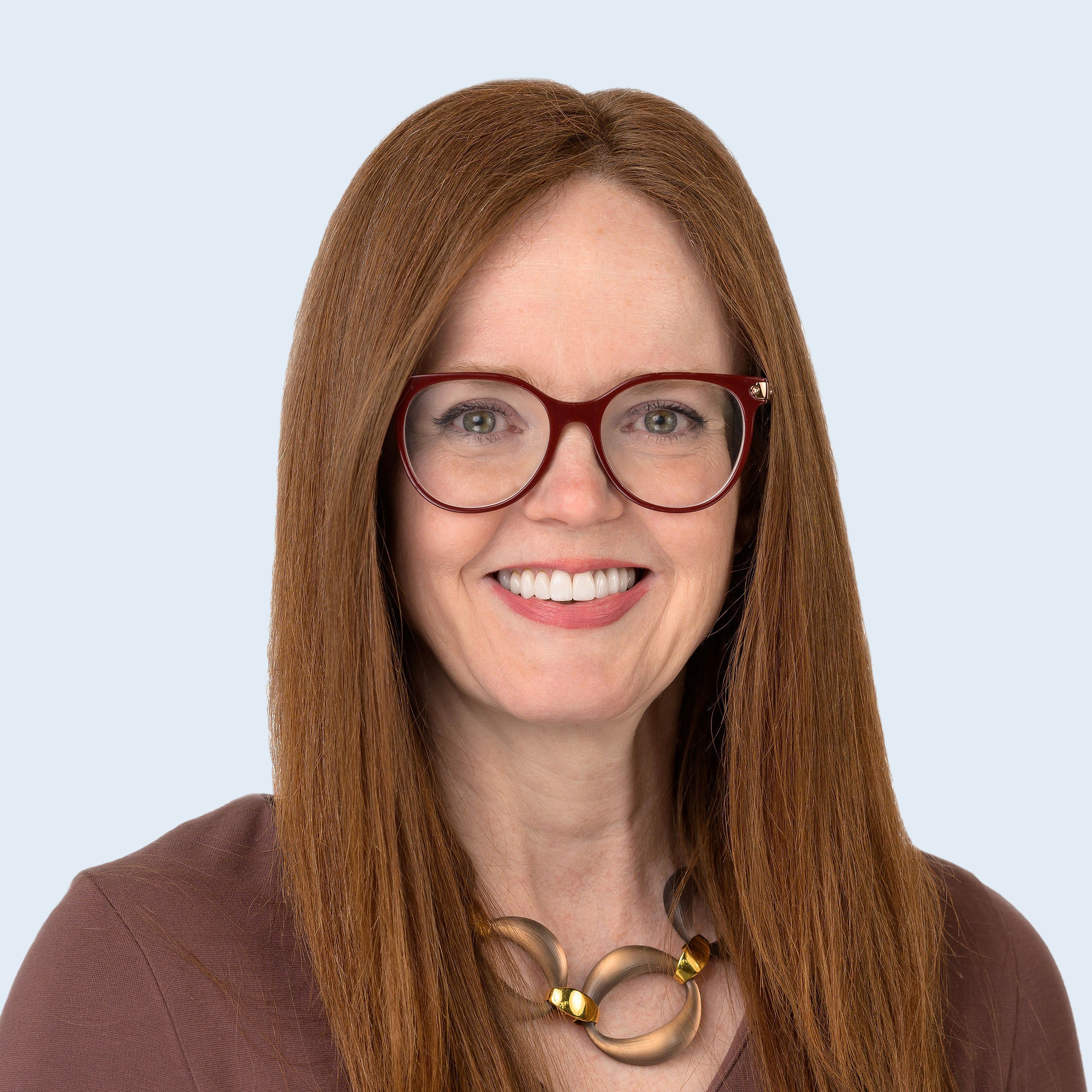 A headshot of Mary Pinder-Schenck in suit