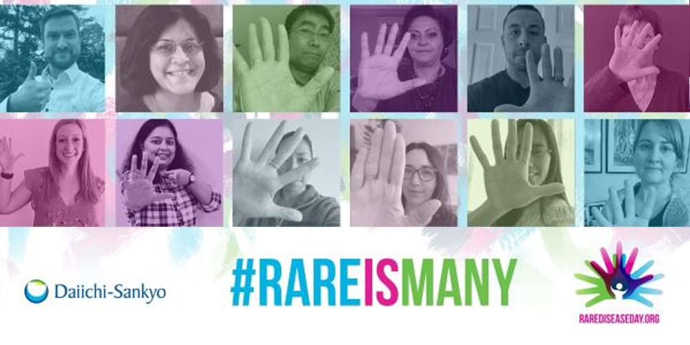 12 people raising hands in support of rare disease day