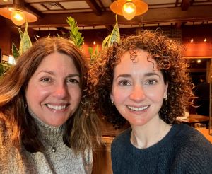 Two women smiling